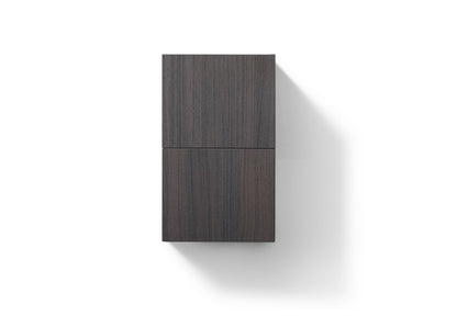 A gray oak bathroom linen side cabinet with a closed door, featuring a sleek modern design.