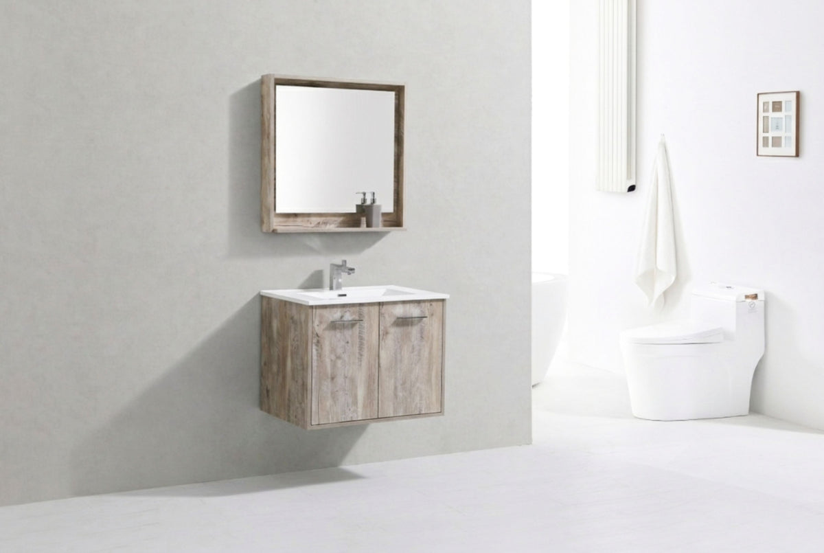 Bathroom with wooden vanity, mirror, and toilet.