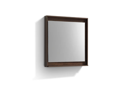 A rectangular rosewood framed mirror with a shelf below it, displayed against a white background.
