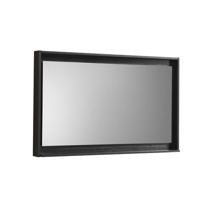 A 48 inch wide mirror with a black frame and shelf below it.