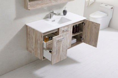 Bathroom vanity with open cabinet doors, sink, and toiletries.